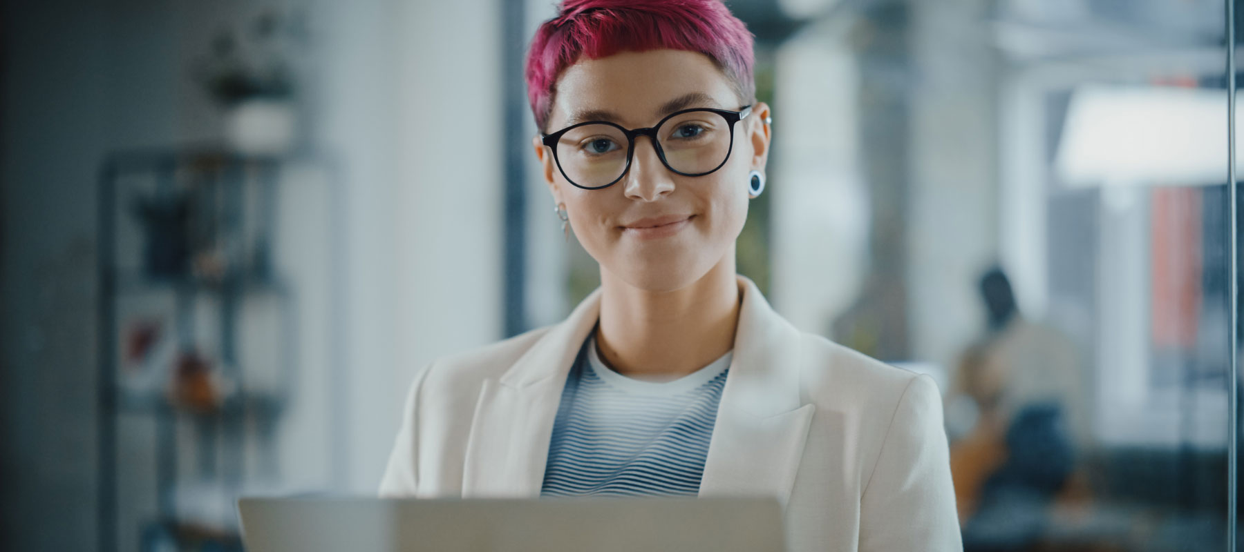 Young woman with short pink hair