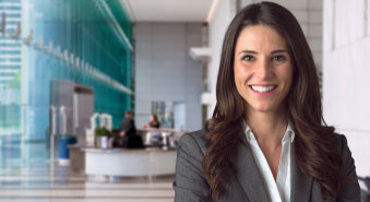 Woman in grey suit jacket